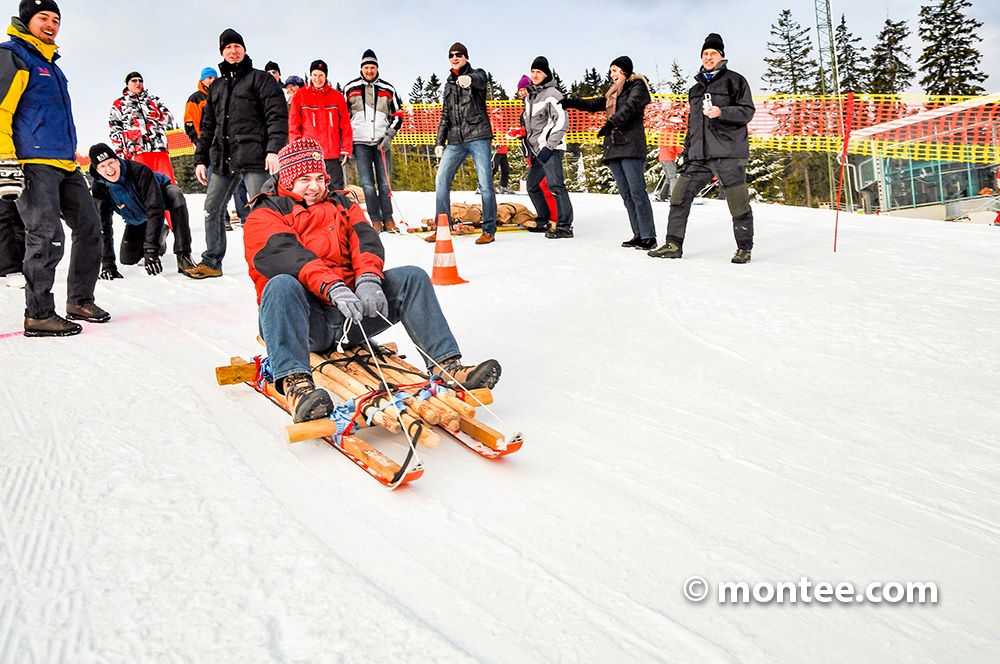 Schlitten Bauen Teamevent im Schnee Winter Fun Events Salzburg Österreich