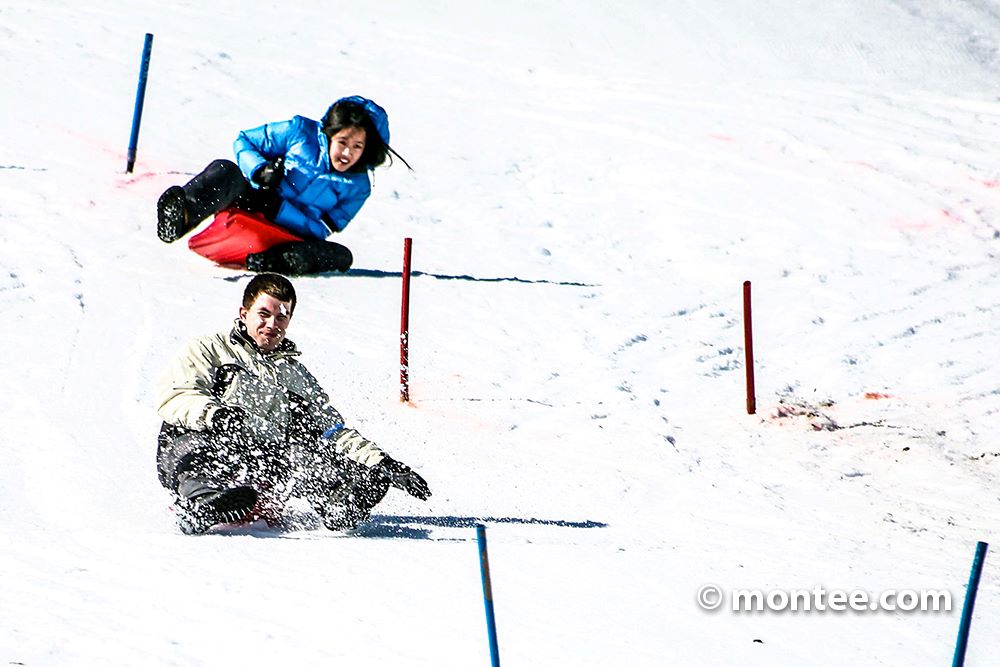 Zipfelbob Wettrennen lustige Outdoor Winter Teamevent Ideen Salzburg