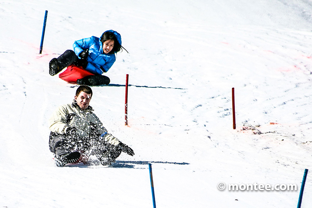 Zipfelbob race funny outdoor winter team event ideas Salzburg