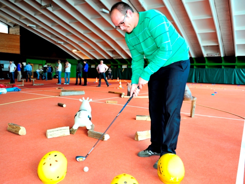 Fun corporate event hit the boss station indoor golf